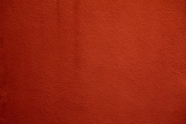 hacim alçısıyla kaplı kırmızı bir duvarın dokusu, metin için boşluk, kopyalamak için boşluk