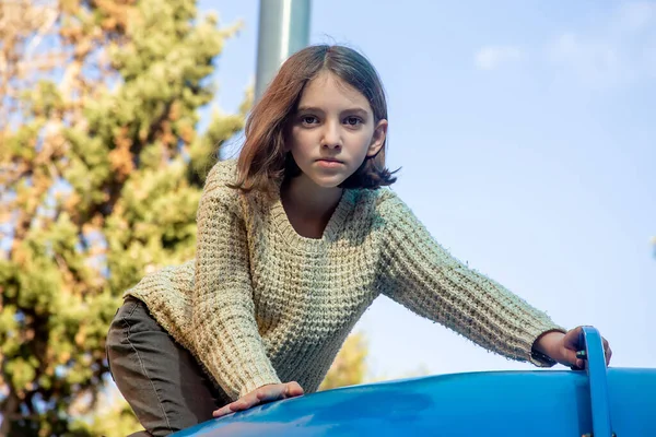 Beautiful Teenage Girl Sits Thoughtfully Top Children Slide Shade Sunny — Stock Photo, Image