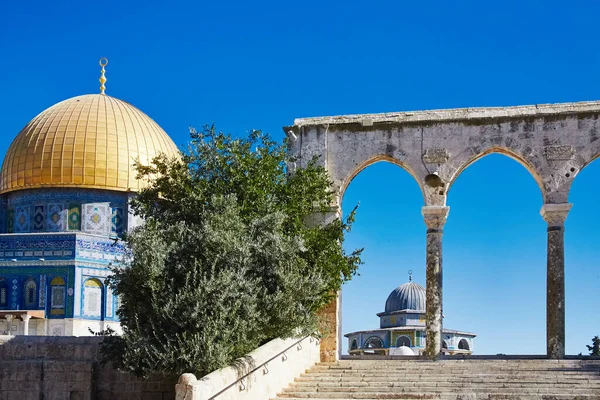 Temple Mount with gateway arches leading to Dome of the Rock Islamic monument and Dome of the Chain shrine in Je..