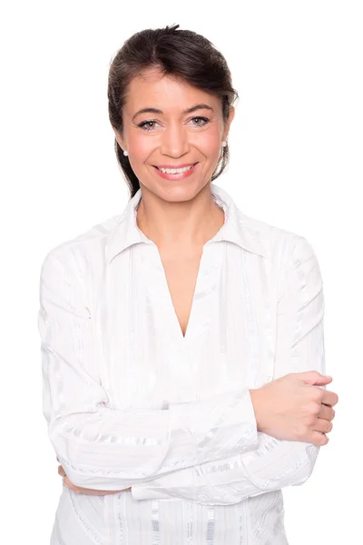 Smiling middle aged woman posing Stock Image