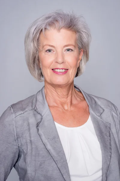 Senior woman smiling — Stock Photo, Image