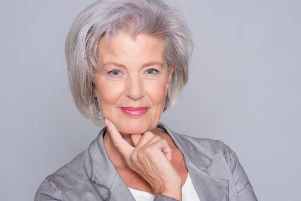 Senior woman smiling — Stock Photo, Image