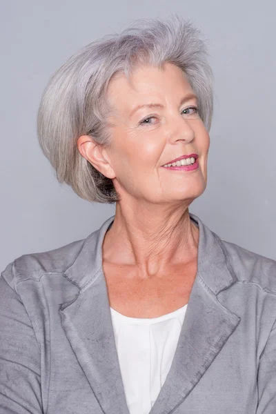 Senior woman smiling — Stock Photo, Image