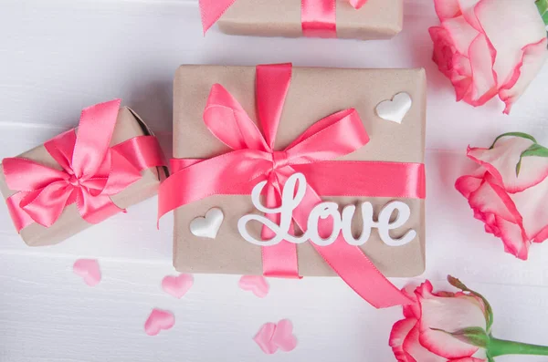 Word Love White Letters Gift Boxes Pink Ribbons Love Concept — 图库照片