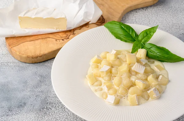 Italian Potato Gnocchi Brie Cheese Sauce Selective Focus Light Background — Stock Photo, Image