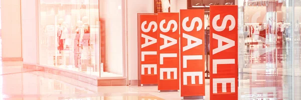 Sale red sign at mall. Discount concept