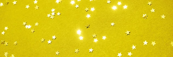 Fondo de estrellas doradas. Fondo de brillo amarillo. Textura dorada. Año nuevo lujo — Foto de Stock