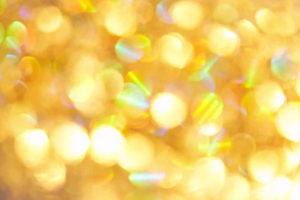Bokeh circle with gold sparkles background. Yellow glitter backdrop