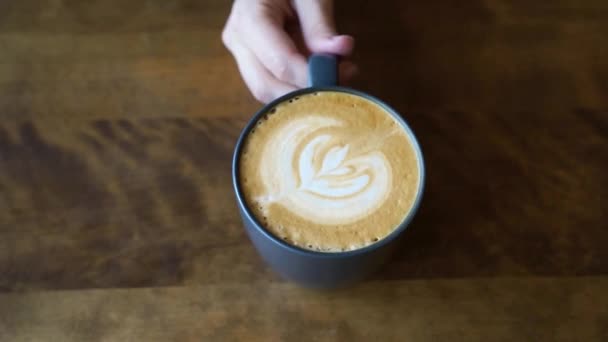 Coffee break. Cappuccino cream art. Breakfast beverage at eco mug. — Stock Video