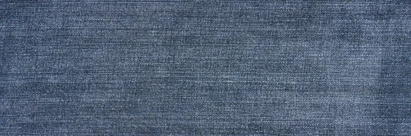 Textura de jeans azul. Têxtil em branco. Tecido macio. Superfície plana — Fotografia de Stock