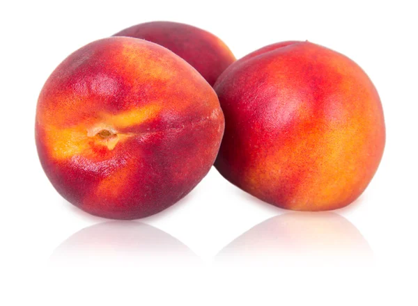 Tre mogna persikor — Stockfoto