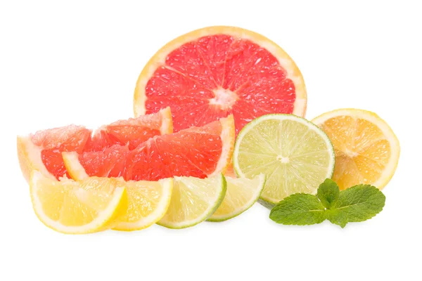Fresh grapefruits, limes, lemons and mint — Stock Photo, Image