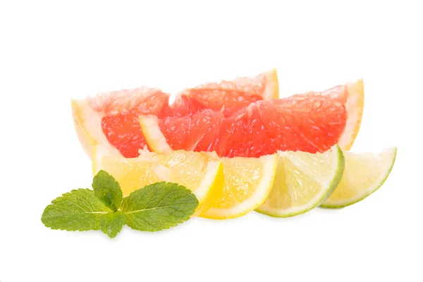 Fresh grapefruits, limes, lemons and mint — Stock Photo, Image