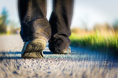 Walking on the road clipart