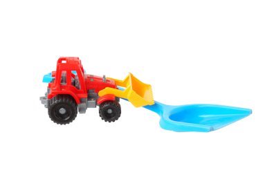 iki plastik oyuncaklar. kürek ve traktör. 