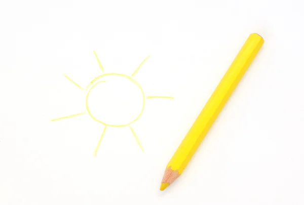 Soleil dessiné et crayon couché sur une feuille de papier — Photo