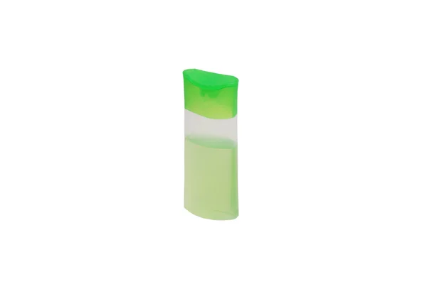 Bir plastik şişe yeşil losyon. — Stok fotoğraf