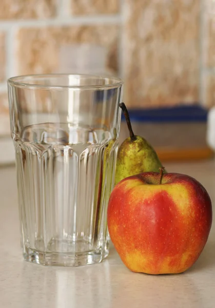 Glass cup and fruits. — Stock Photo, Image