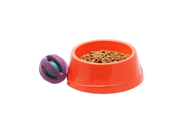 Köpek yemliği yiyecek ve oyuncaklar ile. 