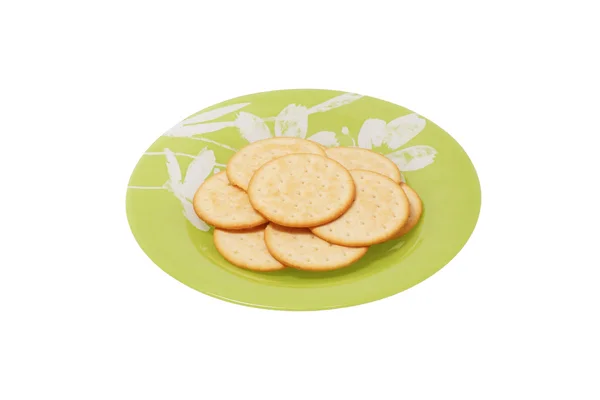 Biscotti nella piastra verde . — Foto Stock