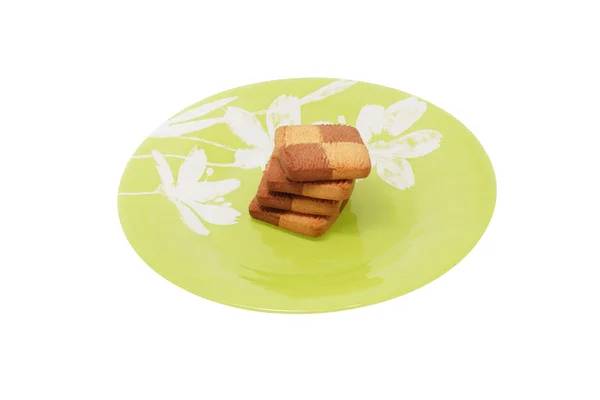 Cookies in the green plate. Isolated. — Stock Photo, Image