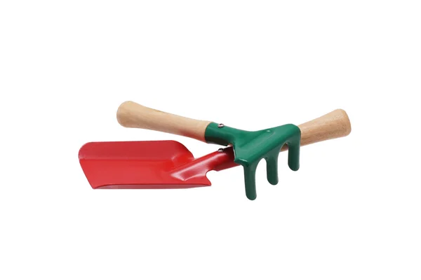 Toy shovel and a rake. — Stock Photo, Image