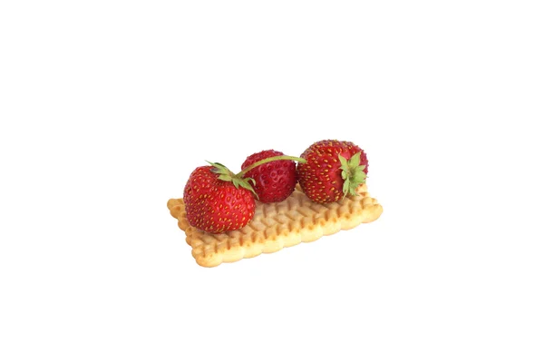 Biscuits and three strawberries — Stock Photo, Image