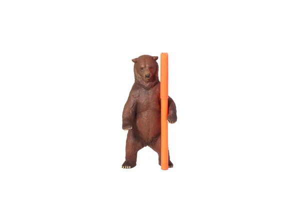 Urso de brinquedo com um marcador laranja . — Fotografia de Stock