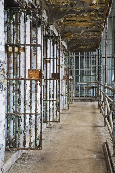 Cell block of the inside of an old prison no longer in use — Stock Photo, Image