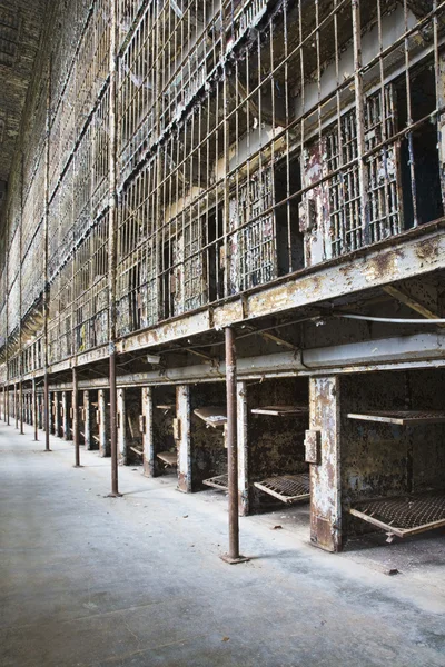 Cell block of the inside of an old prison no longer in use — Stock Photo, Image