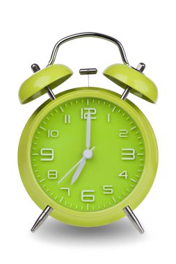 Green alarm clock with the hands at 7 am or pm isolated on a white background. One of a set of 12 images showing the top of the hour starting with 1 am or pm and going through all 12 hours