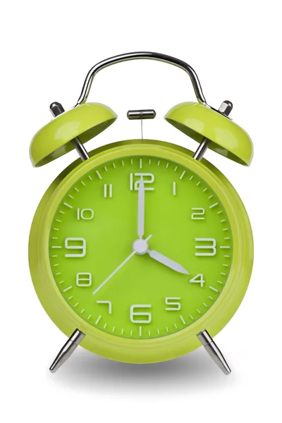 Green alarm clock with the hands at 4 am or pm isolated on a white background. One of a set of 12 images showing the top of the hour starting with 1 am or pm and going through all 12 hours — Zdjęcie stockowe