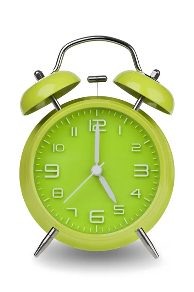 Green alarm clock with the hands at 5 am or pm isolated on a white background. One of a set of 12 images showing the top of the hour starting with 1 am or pm and going through all 12 hours — Stock fotografie