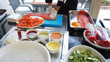 Chef Slicing Smoked Salmon Fish clipart