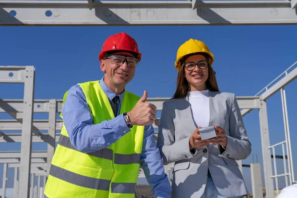 Smiling Female Architect Mature Businessman Thumbs Looking Camera Successful Business — Stock Photo, Image