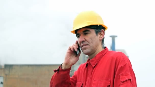 Worker calling by phone — Stock Video