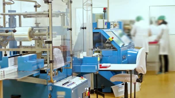 Workers at Pharmaceutical Packaging Production Line. — Stock Video