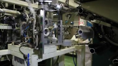 Robotik Kol fabrika montaj hattı - külotlu çorap üretim üzerinde çalışma