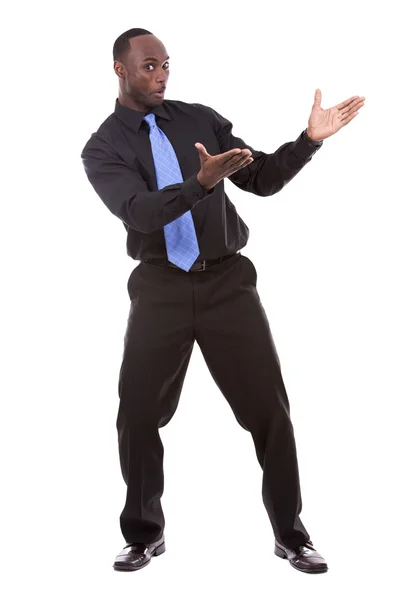 Przystojny czarny człowiek wskazującego — Zdjęcie stockowe