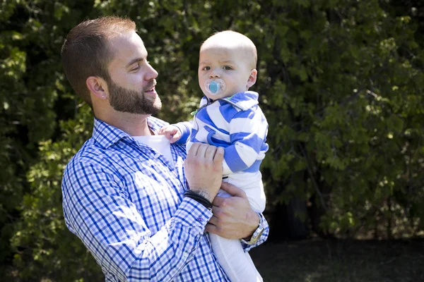 Father and son outdoors — Stock Photo, Image