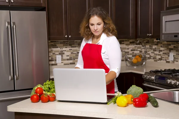 Woman in the kitchen — Stock Photo, Image
