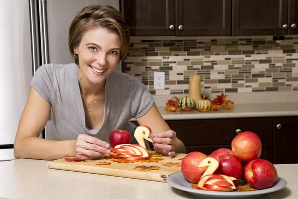 Woman with apples — Stock Photo, Image