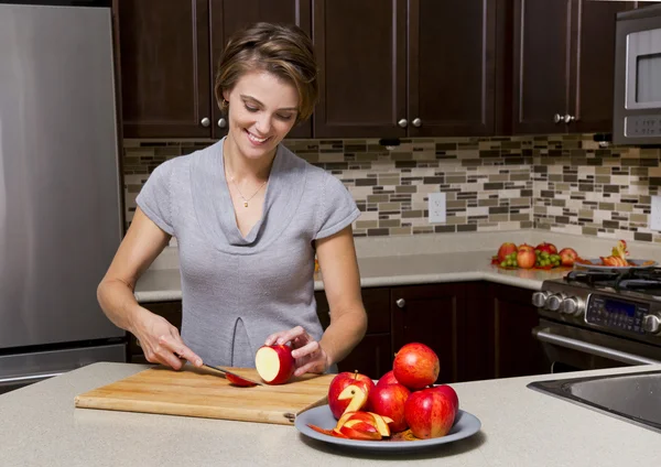 Woman with apples — Stock Photo, Image