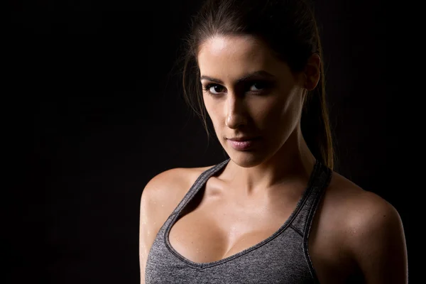 Fitness woman on black background — Stock Photo, Image