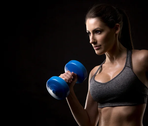 Fitness woman on black background — Stock Photo, Image