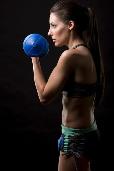 Fitness woman on black background — Stock Photo, Image