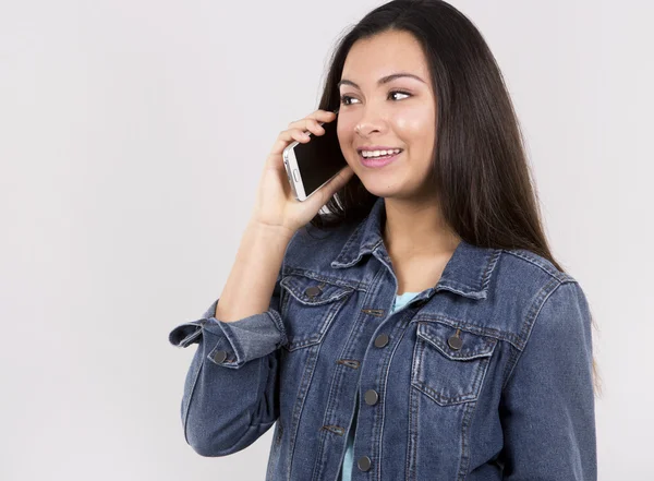 Teen and cell phone — стоковое фото