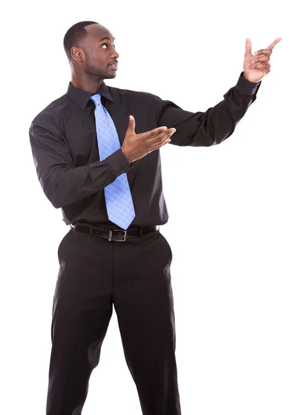 Handsome black man pointing — Stock Photo, Image