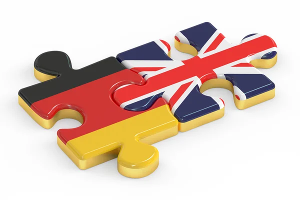 Storbritannien och Tyskland pussel från flaggor, relation koncept. 3D renderin — Stockfoto
