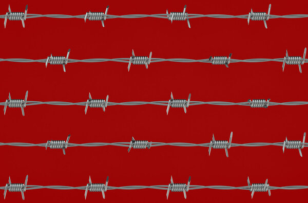 barbed wire on red background